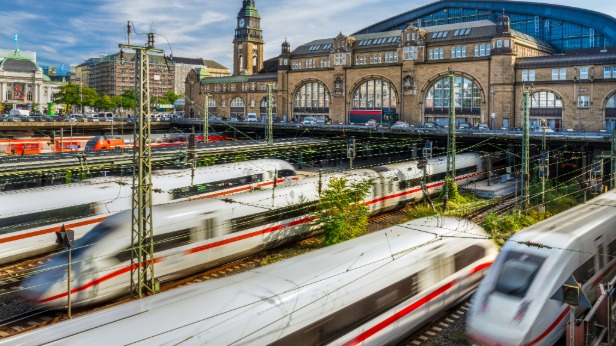 Fast trains going station in Germany